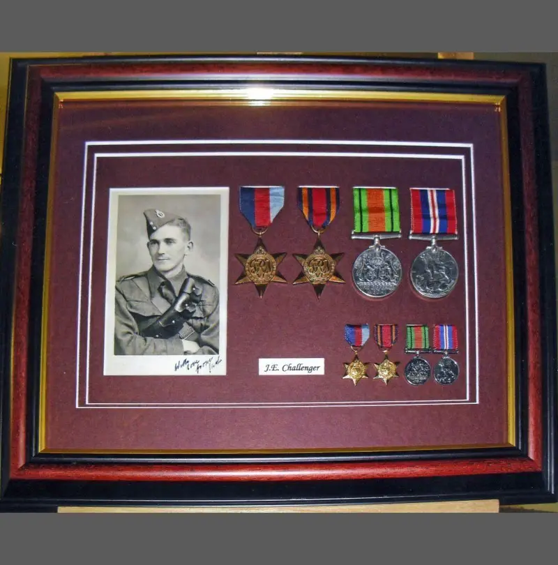 War medals and portrait photograph framed by Tripps of Keynsham Bath