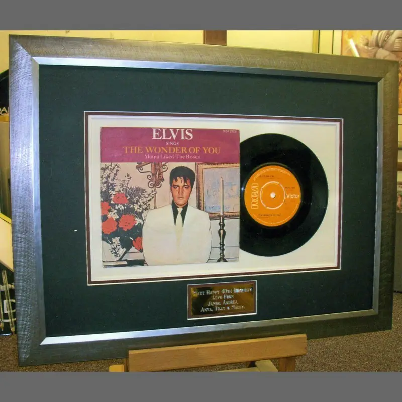 Framed Elvis record and sleeve by Tripps of Keynsham